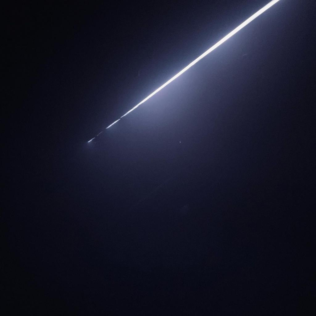 dark room with single overhead line of light glowing in the fog